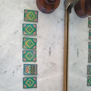 Green and Red Card Game with Geometric Patterns